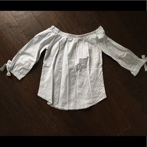 Off the shoulder white and navy stripped shirt